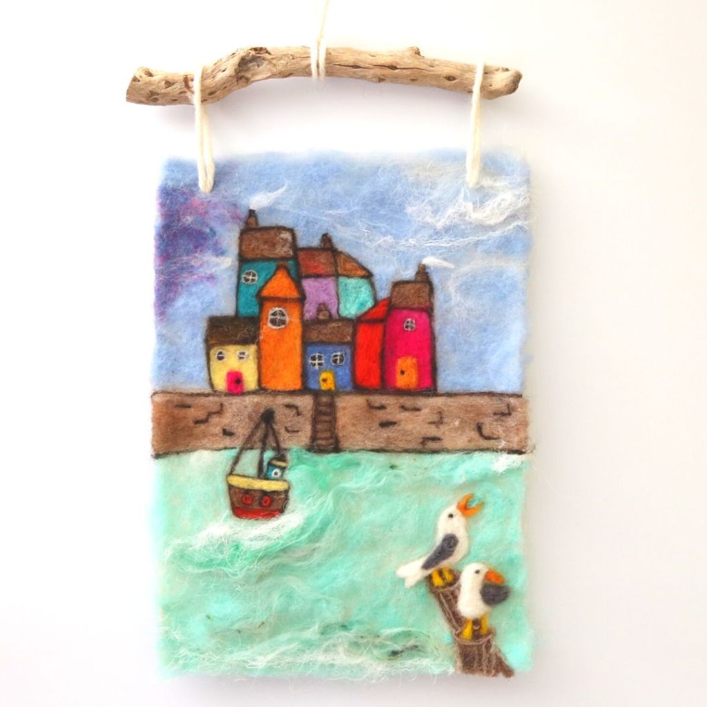 Image shows a beautiful Cornish harbour scene as an example of a needle felted picture and how you can paint with wool.